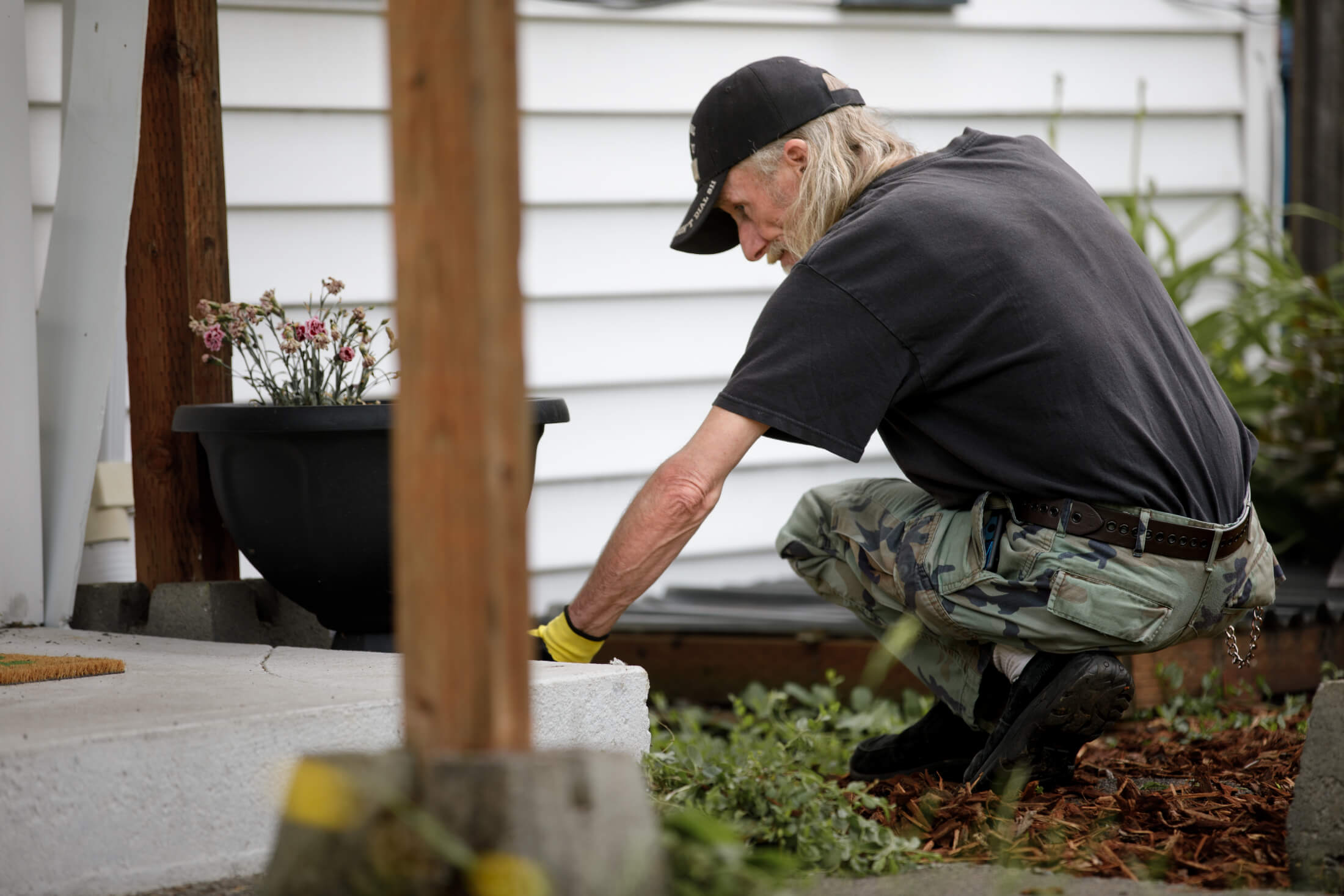 man working on porch